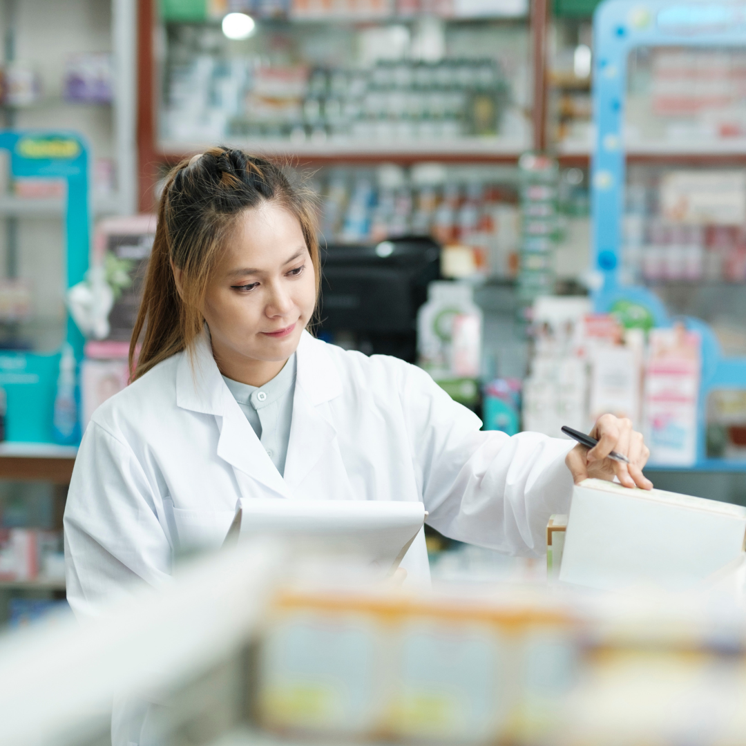 A pharmacist checking documents