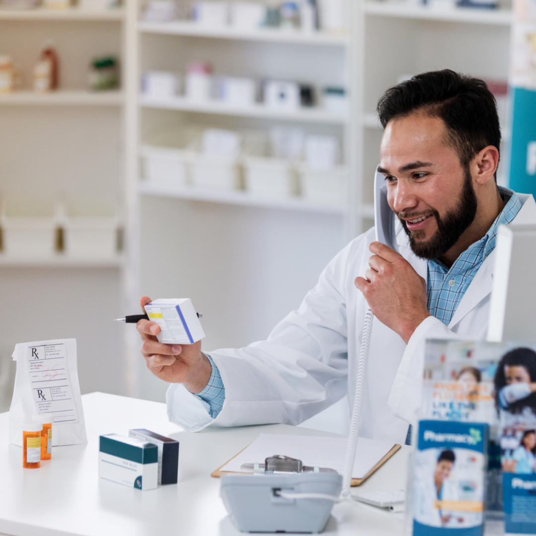 a man on the phone while checking a box
